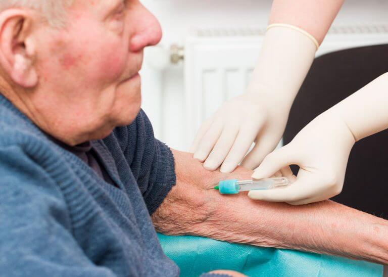 elderly man receiving treatment for Myocardial Infarction STEMI at a hospital